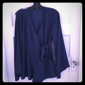 Navy wrap romper with bell sleeves